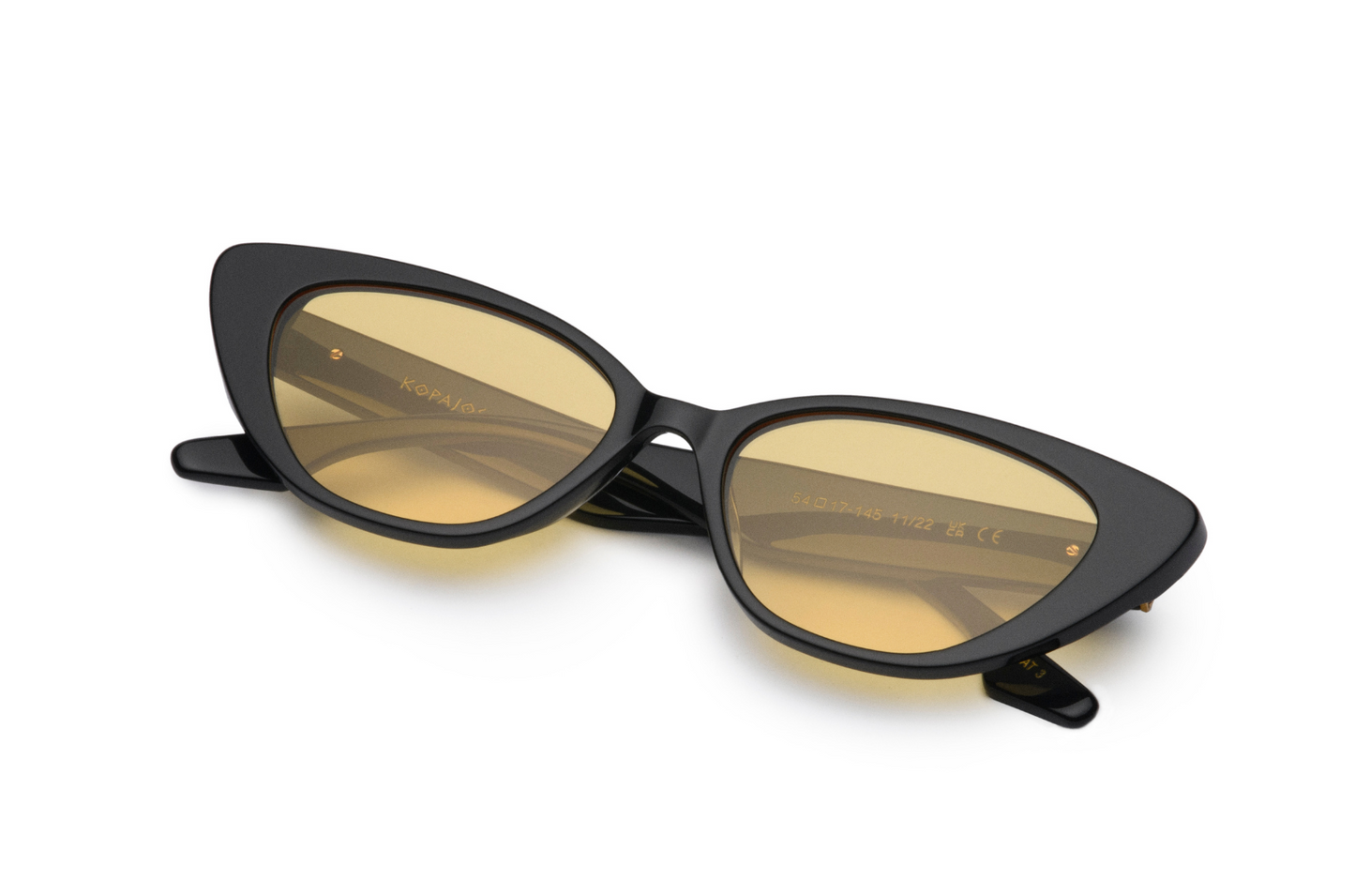Black cat eye sunglasses with yellow lenses by Kopajos