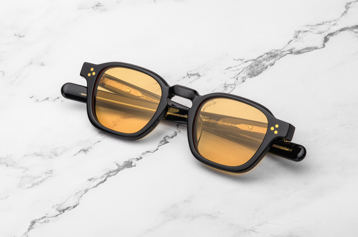 black square frame sunglasses with orange polarized lenses
