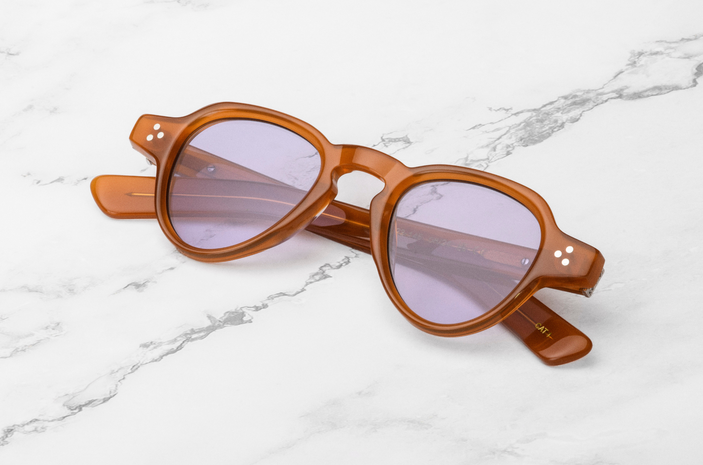 retro round sunglasses with liliac lenses