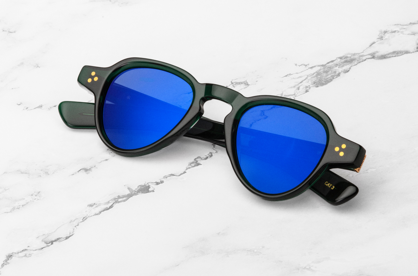 Black round sunglasses with blue lenses