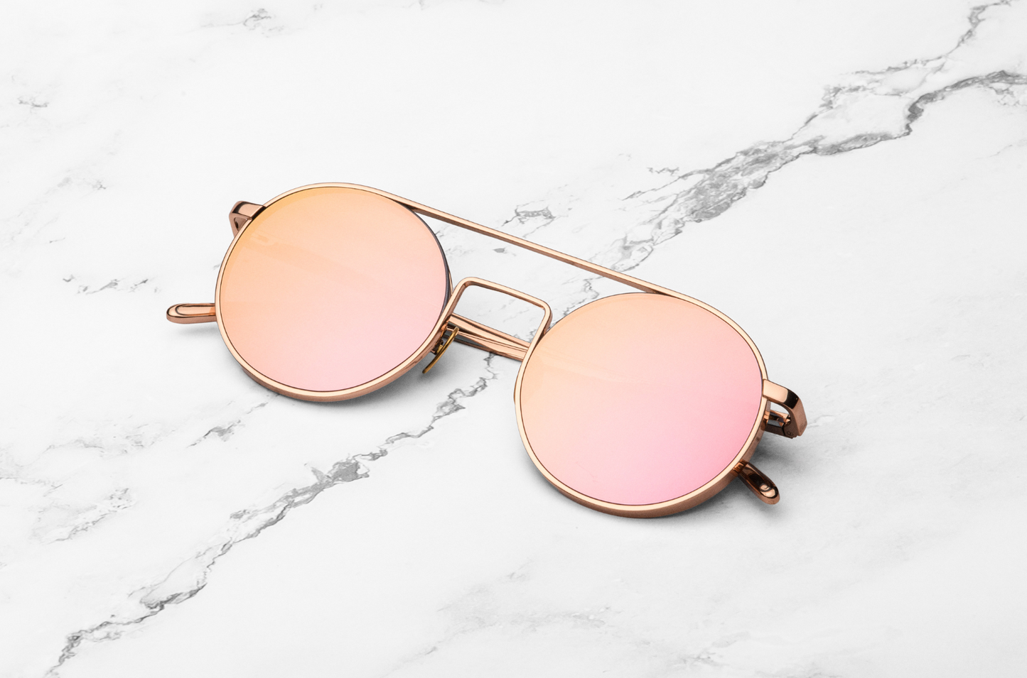 Pink round sunglasses for women with polarized lenses by Kopajos