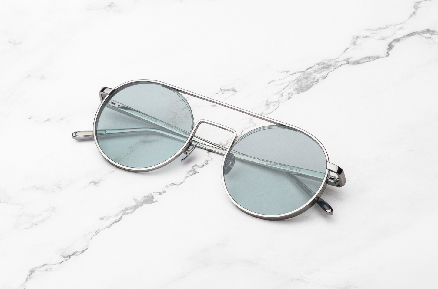 Silver round frame sunglasses for men and women by Kopajos