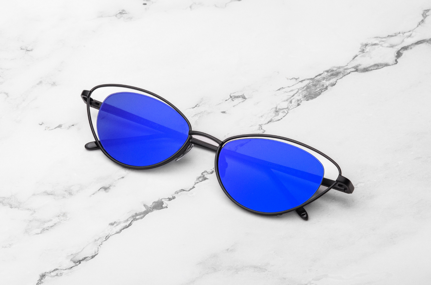 Black cat eye sunglasses for women with blue lenses