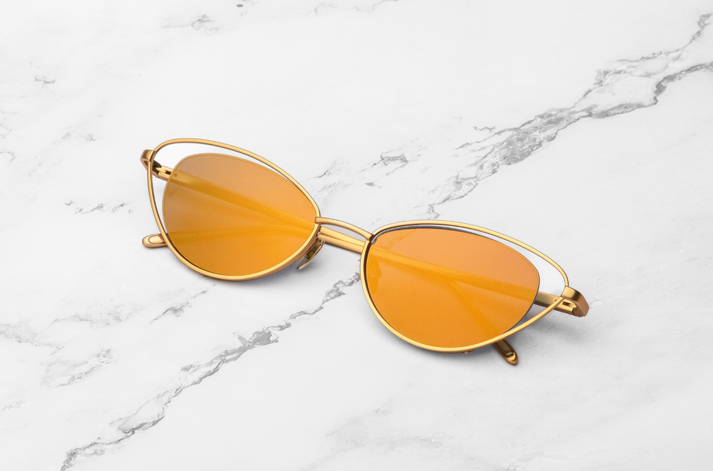 Gold cat eye sunglasses for women with gold lenses