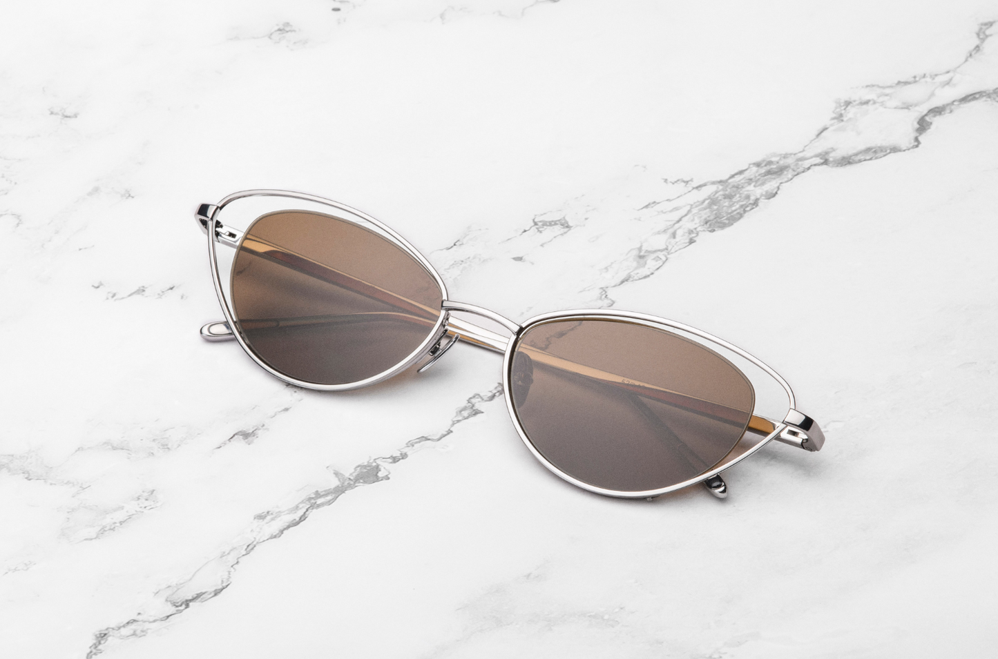 Silver cat eye sunglasses for women with brown lenses