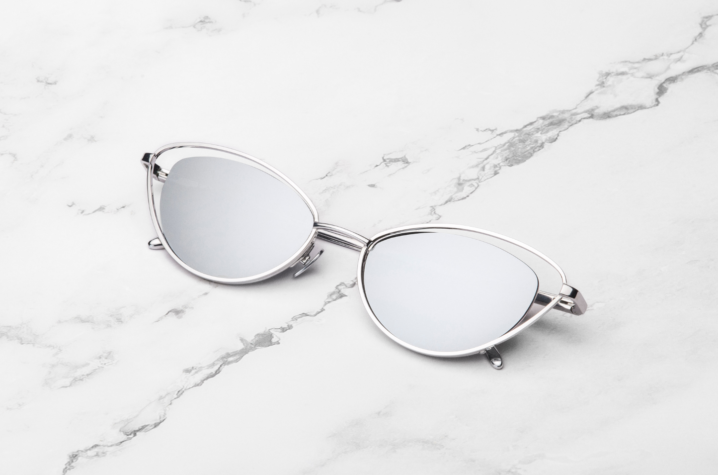 Silver cat eye sunglasses for women with silver mirrored lenses