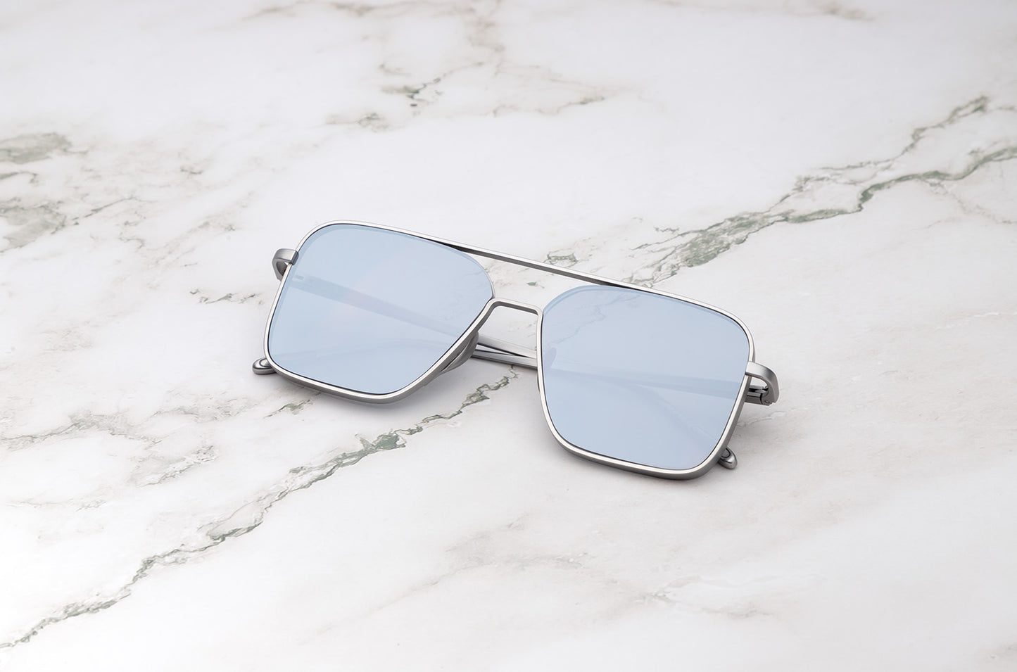 Silver aviator sunglasses with mirror polarized lenses by Kopajos
