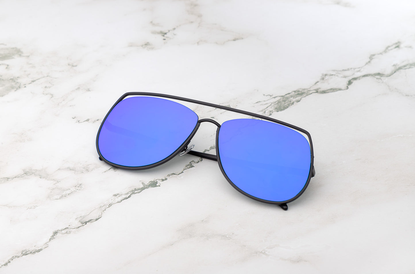 Black aviator sunglasses with polarized blue lenses by Kopajos
