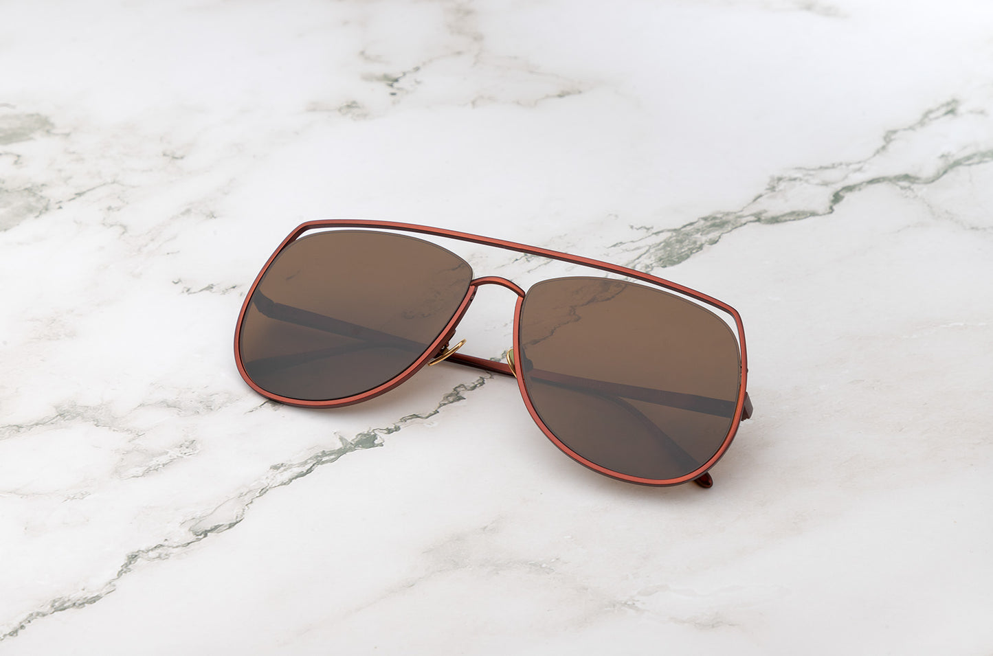 Bronze aviator sunglasses with brown polarized lenses by Kopajos
