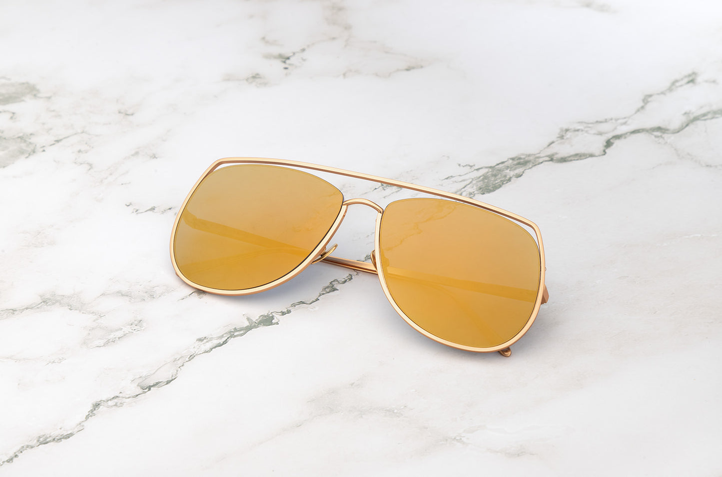 Gold aviator sunglasses with mirror gold polarized lenses by Kopajos