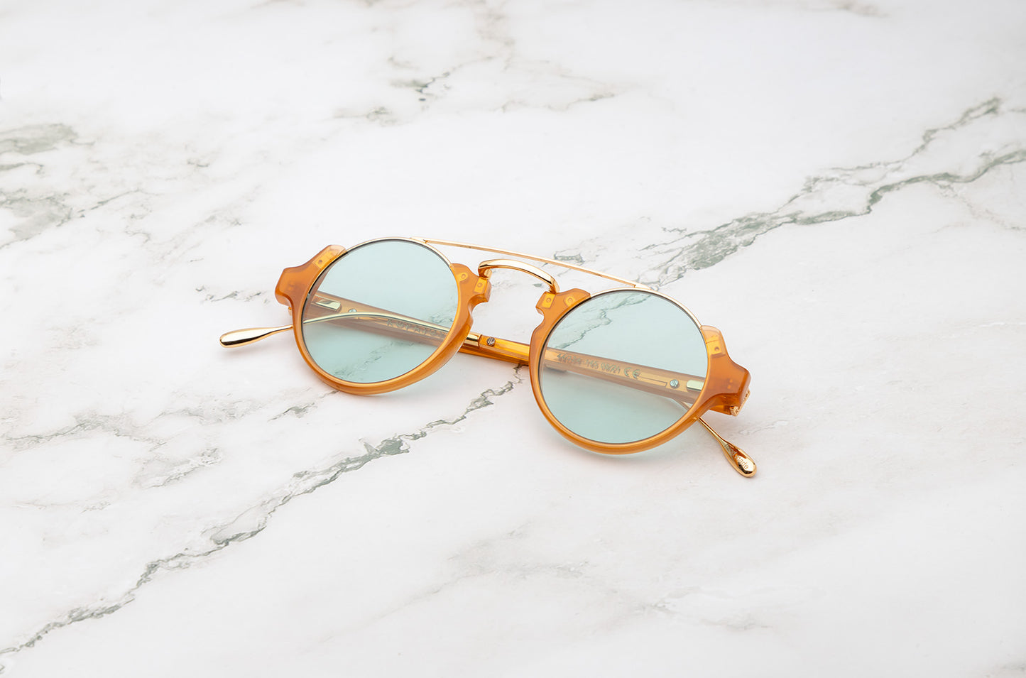 Honey round sunglasses for men with polarized light green lenses by Kopajos