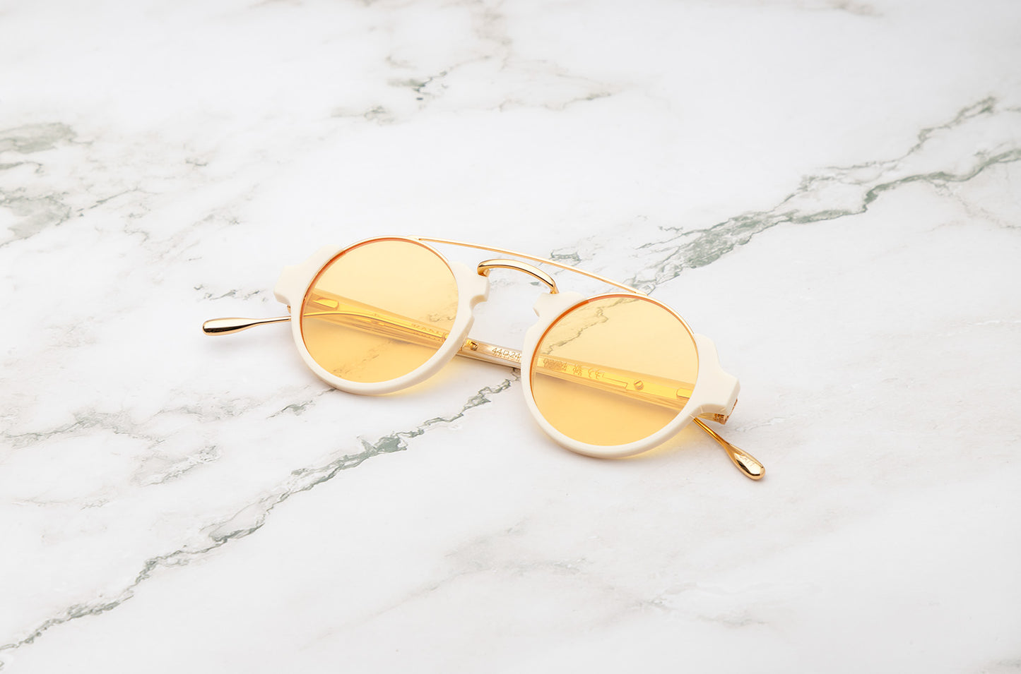 White round sunglasses with yellow polarized lenses by Kopajos