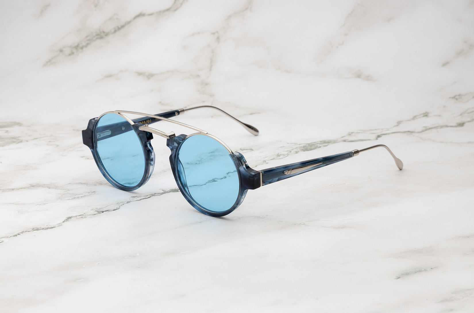 Blue round sunglasses for women with polarized light blue lenses by Kopajos
