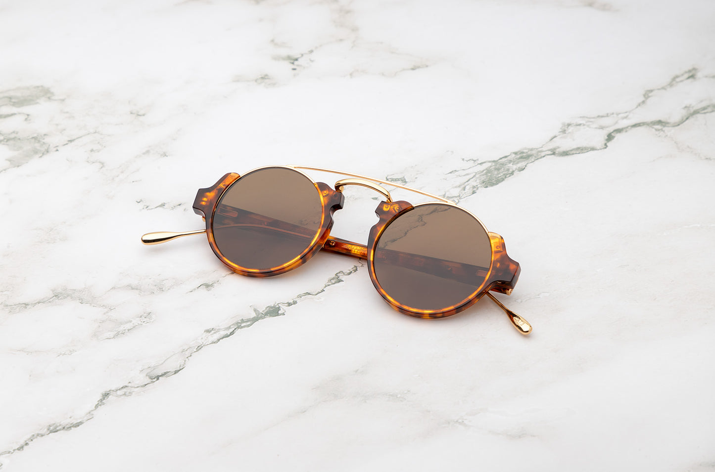 Tortoise round sunglasses for women with polarized brown lenses by Kopajos