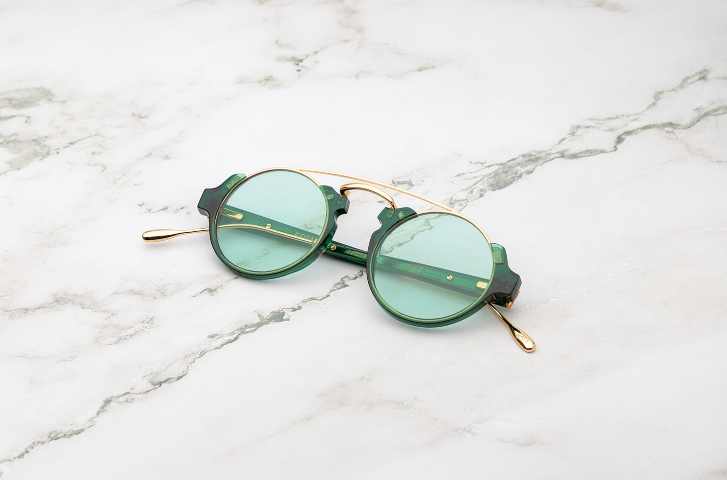 Isabella green round sunglasses with polarized lenses by Kopajos