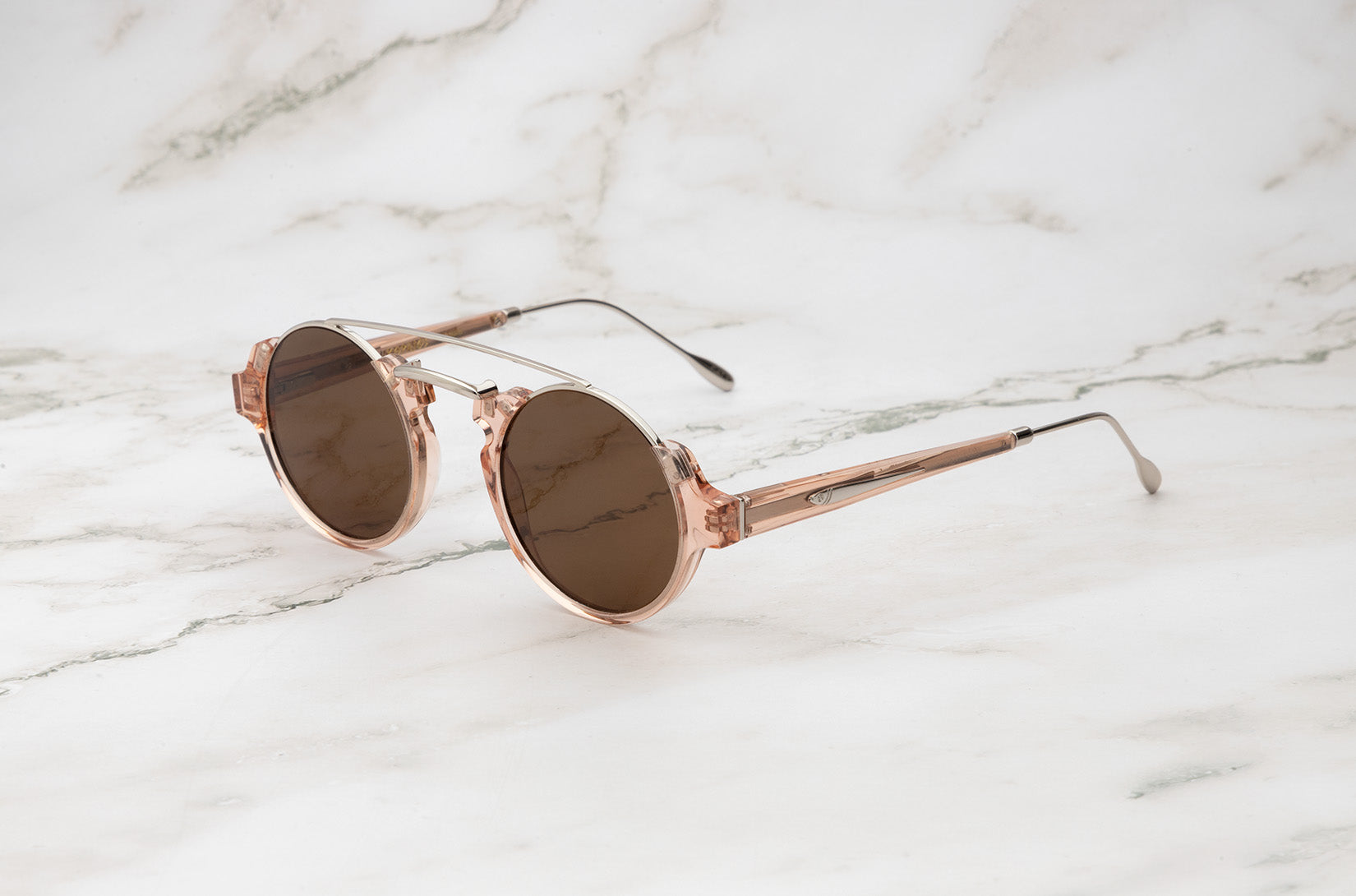 Pink round sunglasses for women with brown polarized lenses by Kopajos