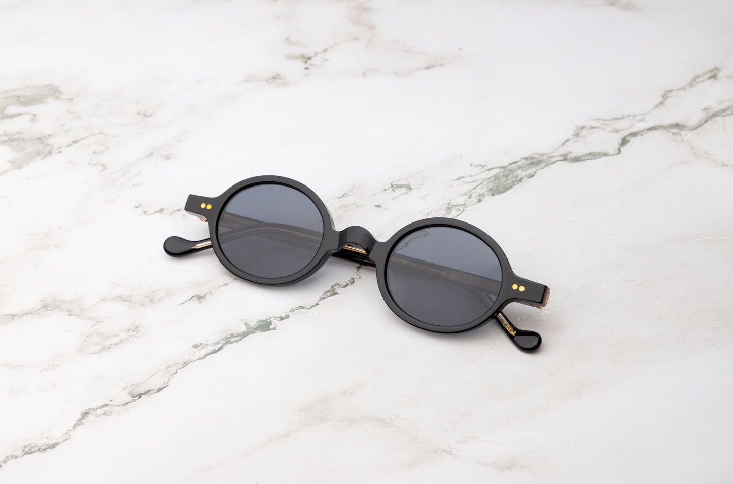 Black round sunglasses for men and women with black polarized lenses by Kopajos