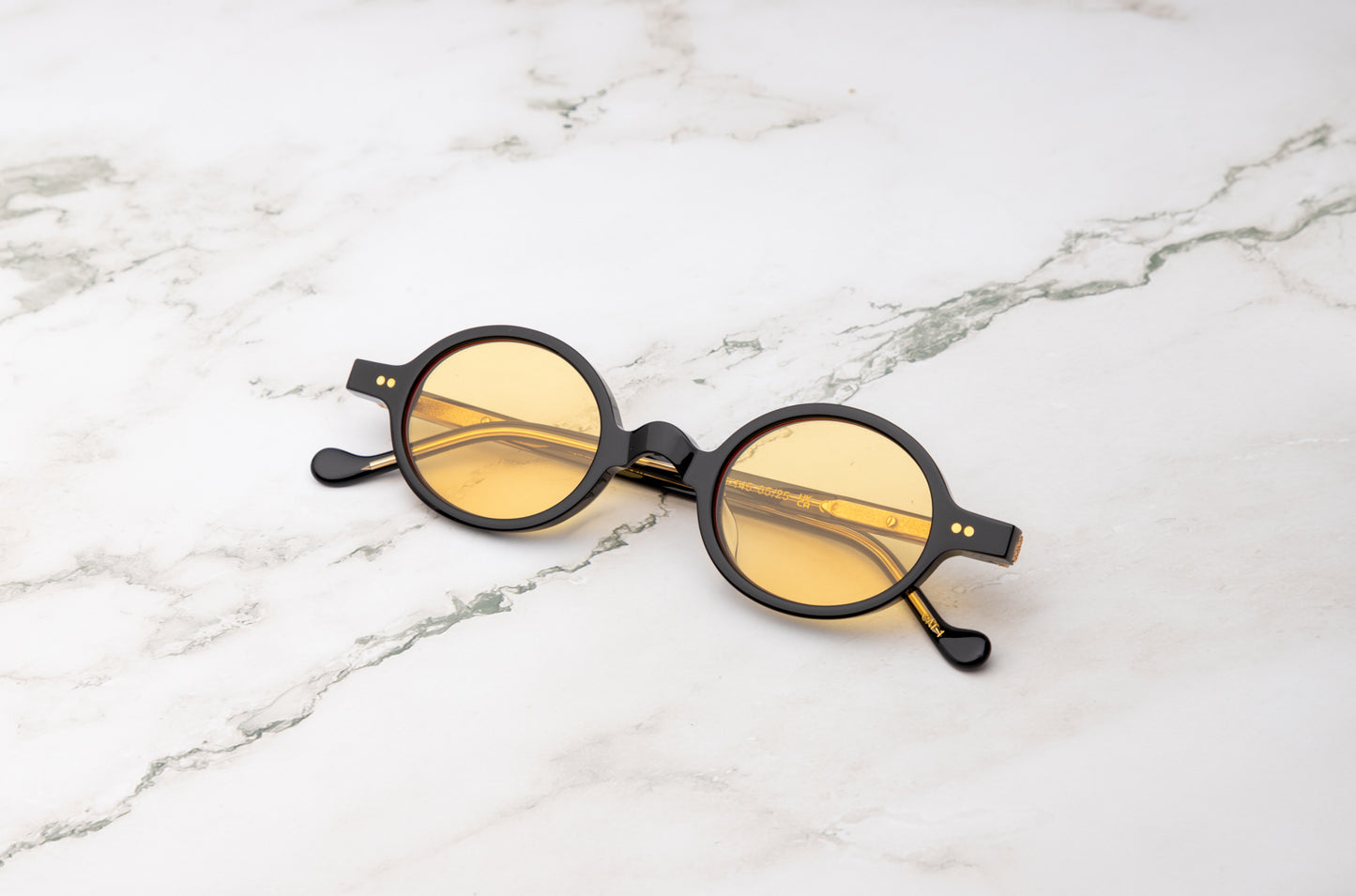 Black round sunglasses with yellow polarized lenses by Kopajos