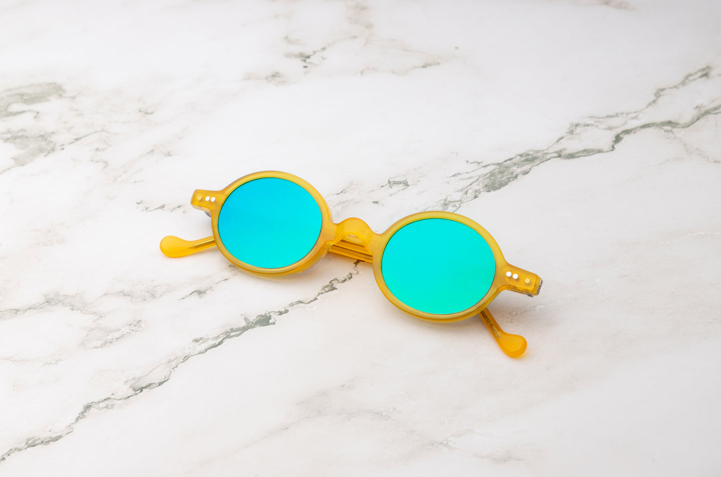 Yellow round sunglasses with mirror polarized lenses by Kopajos