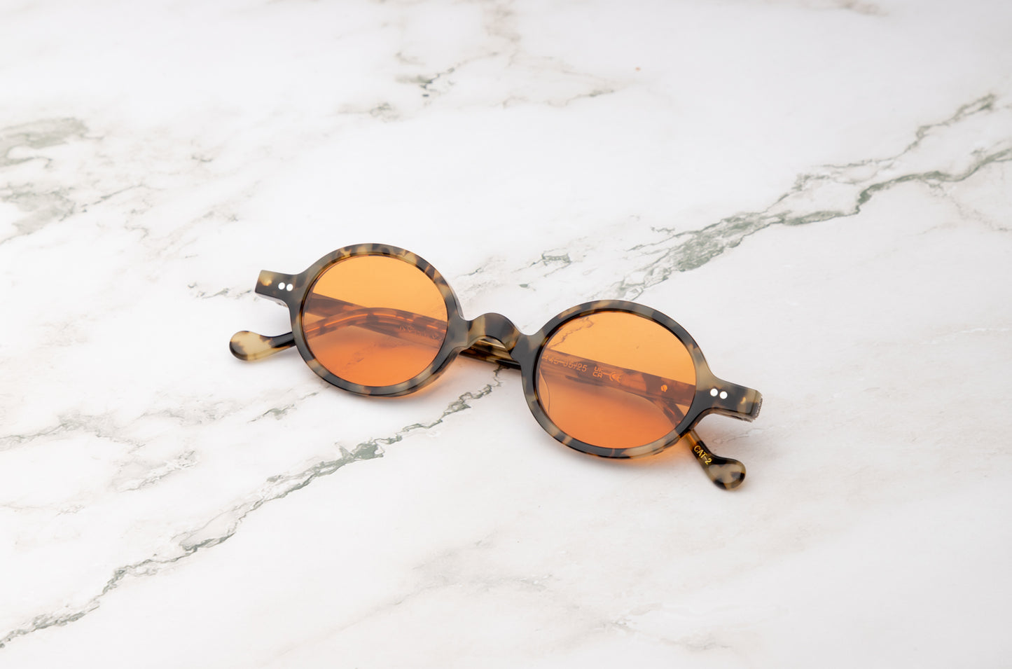 Tortoise round sunglasses for women with orange polarized lenses by Kopajos