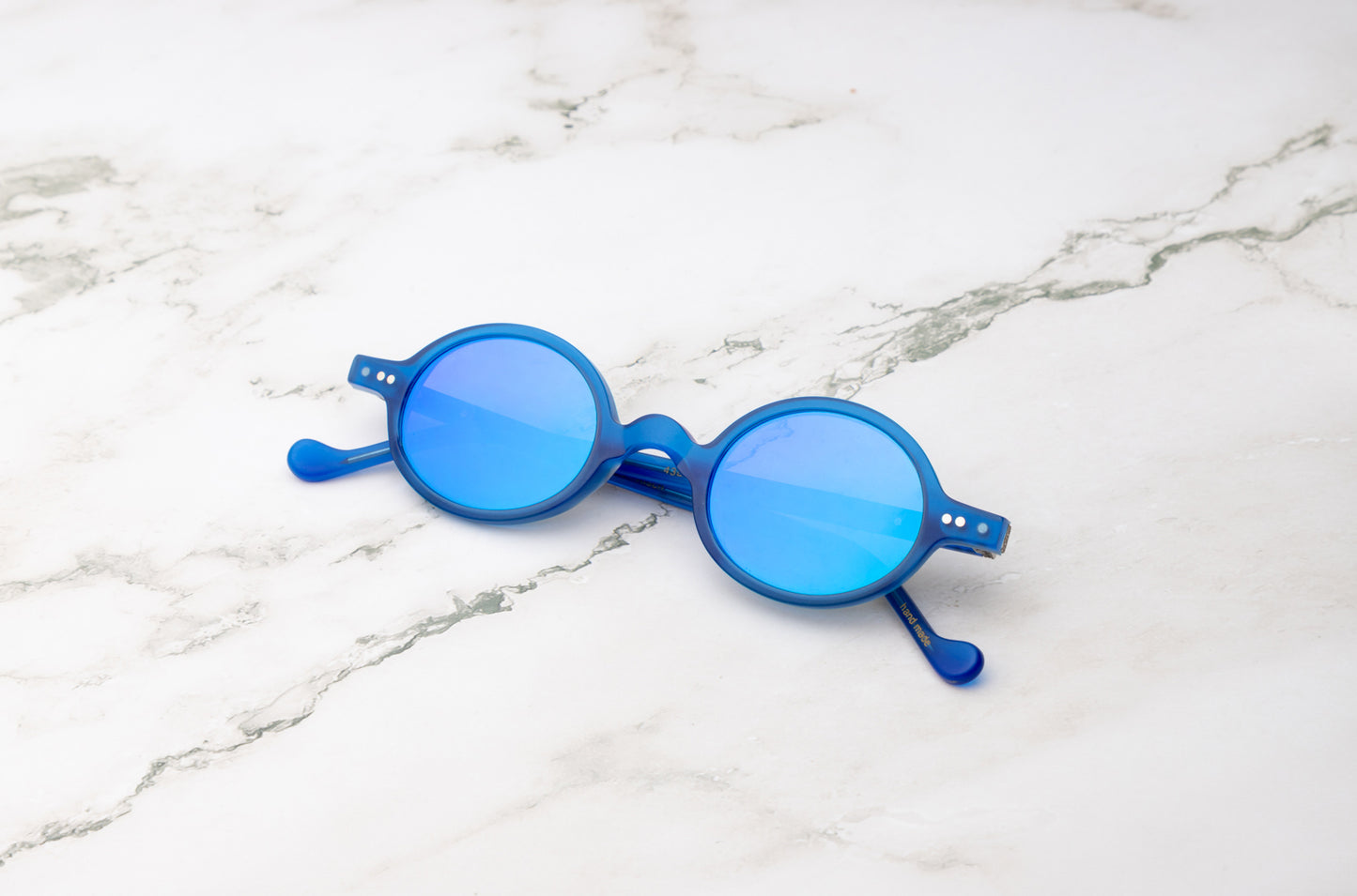Blue round sunglasses for women with blue polarized lenses by Kopajos