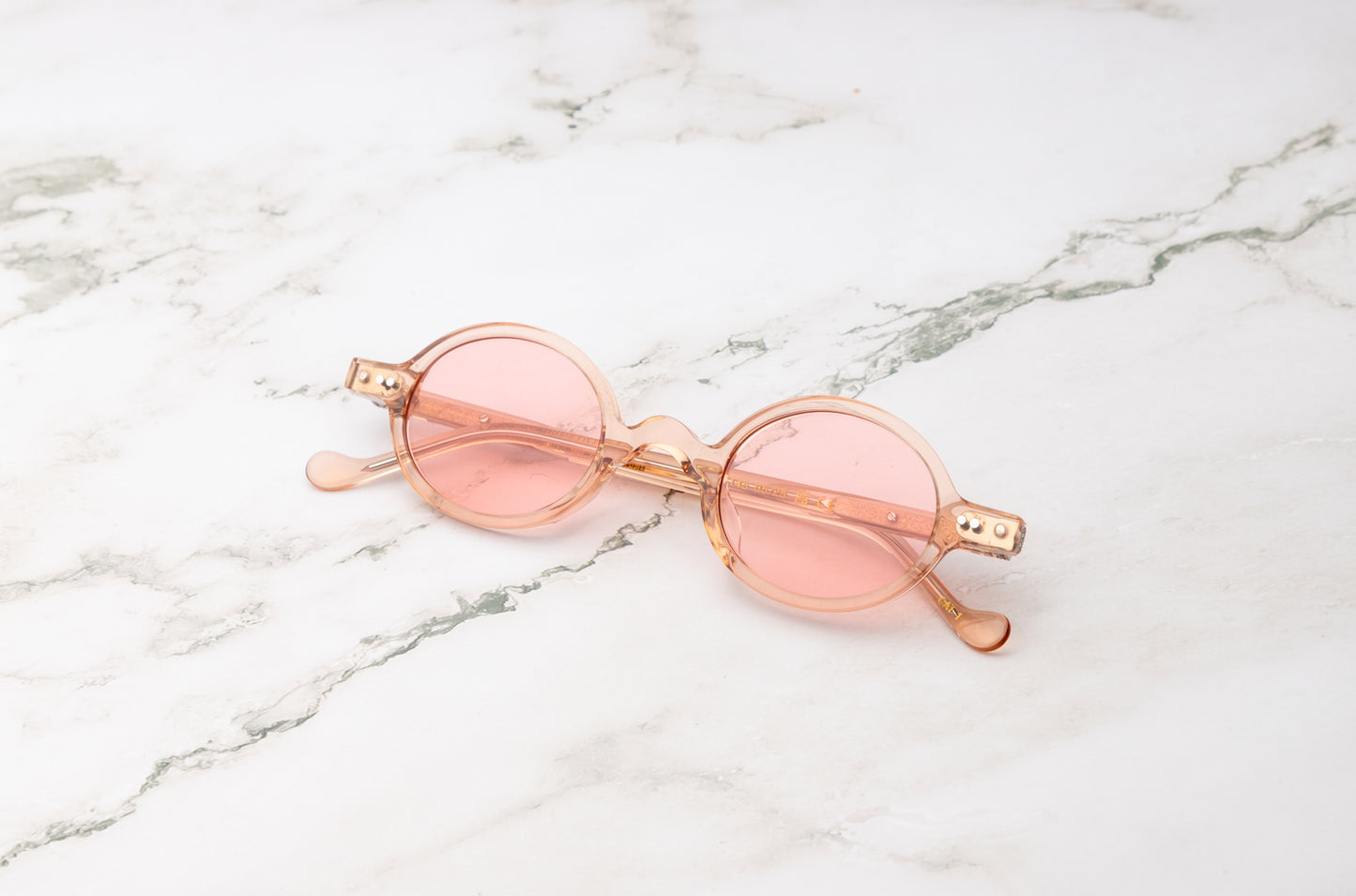 Pink round sunglasses for women with polarized lenses by Kopajos