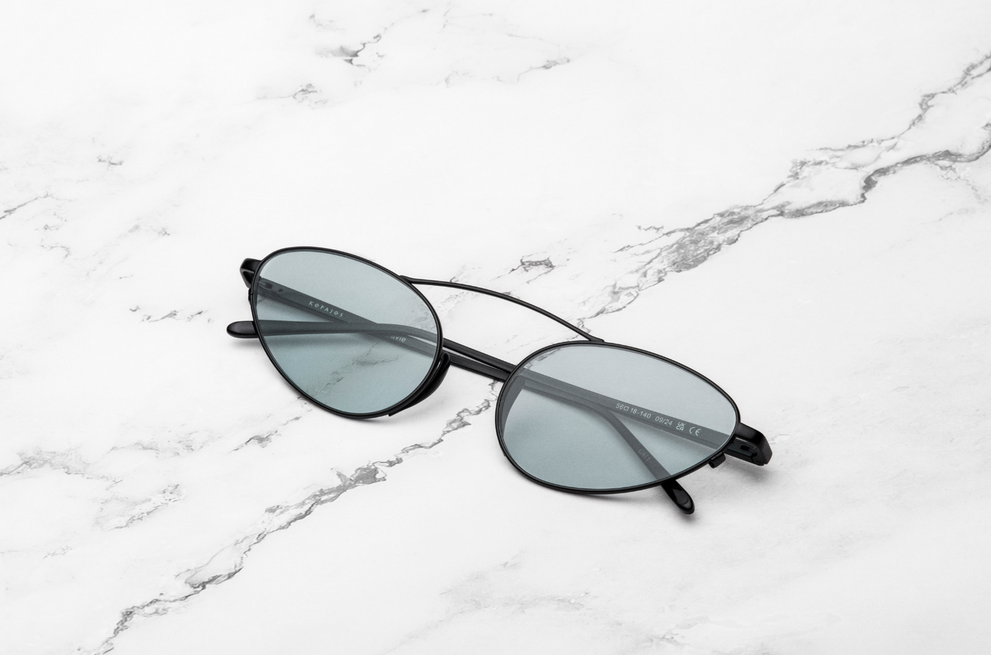 Black oval cat eye sunglasses, Kopajos