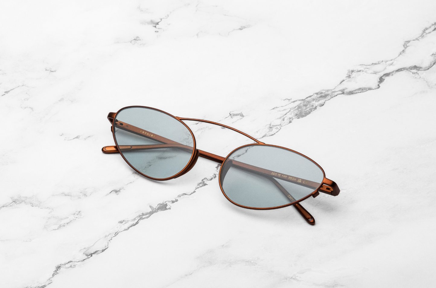 Bronze female cat eye sunglasses with polarized lenses