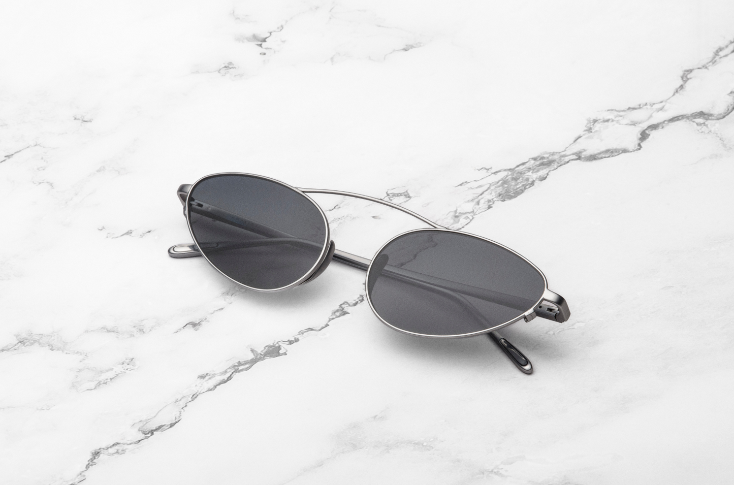 Silver female cat eye sunglasseswith black polarized lenses