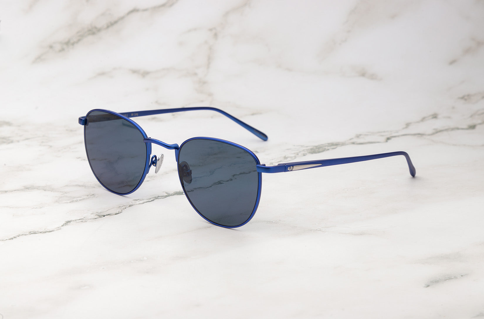 Blue aviator sunglasses with dark polarized lenses by Kopajos