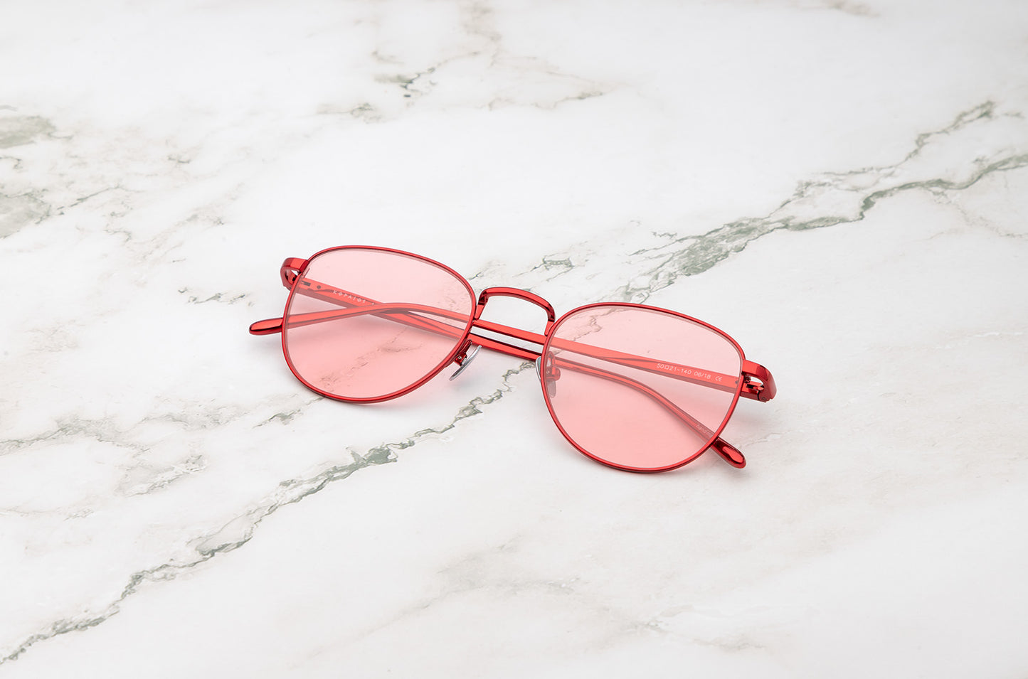 Red aviator sunglasses with polarized lenses by Kopajos