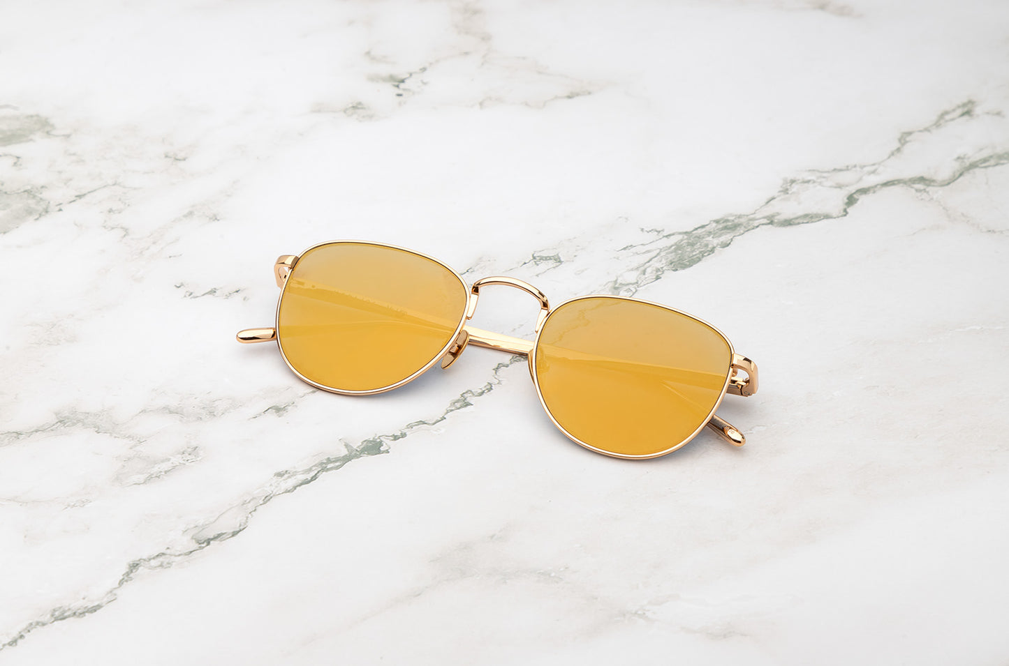 Gold aviator sunglasses with mirror polarized lenses by Kopajos