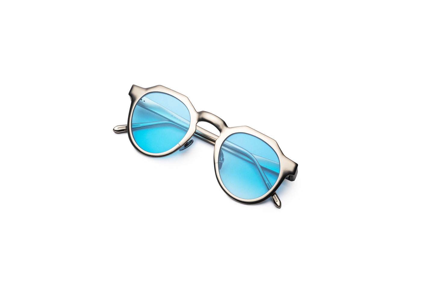 Silver round frame sunglasses with light blue lenses by Kopajos