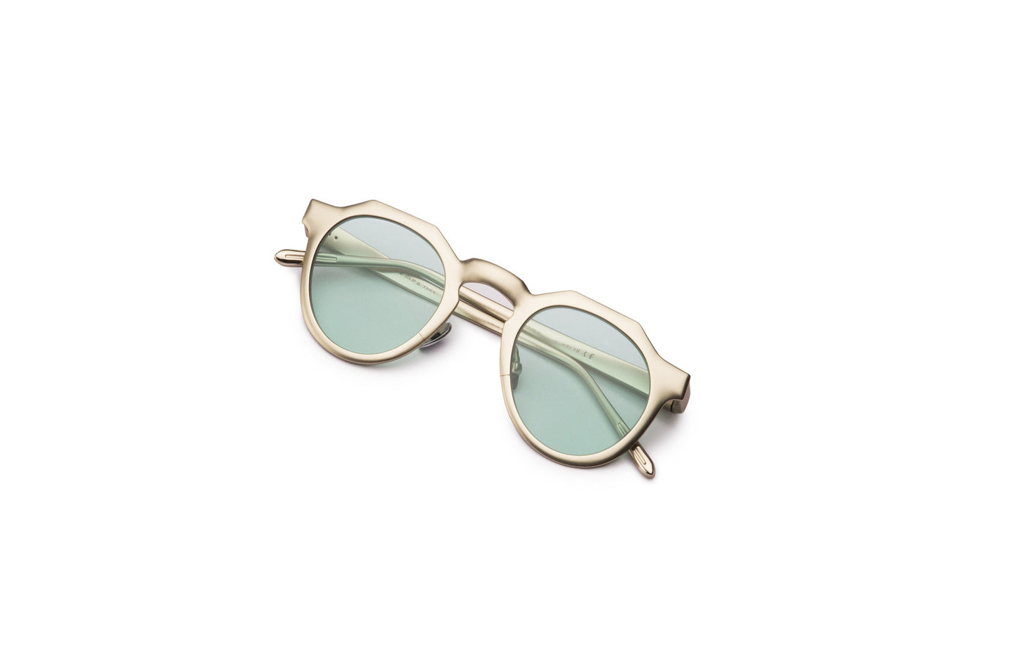 Silver round frame sunglasses with light green lenses by Kopajos