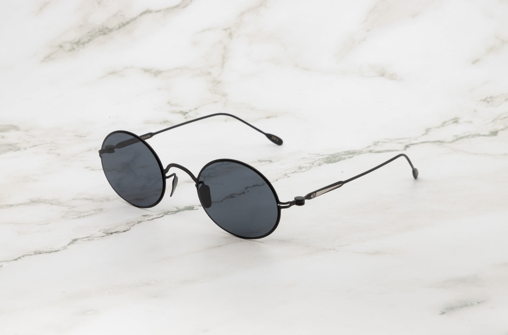 Paloma black round sunglasses for men and women with polarized lenses by Kopajos