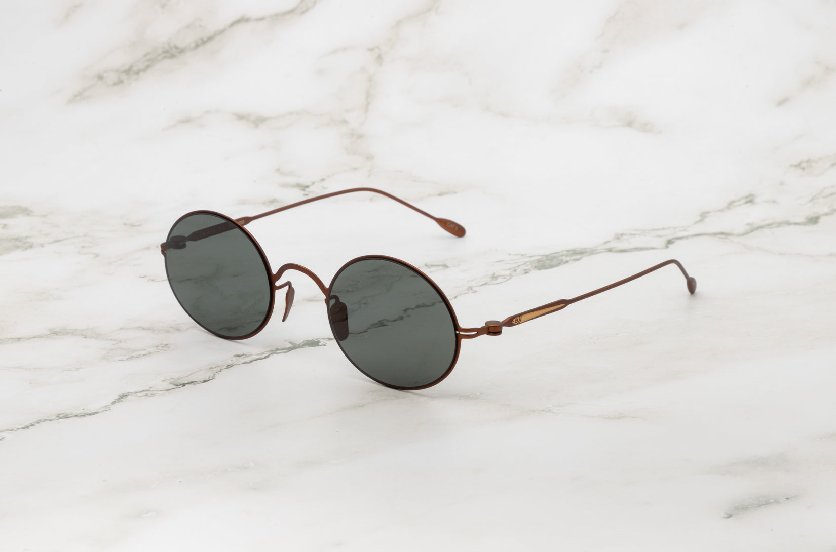 Brown round sunglasses for men and women with polarized lenses by Kopajos