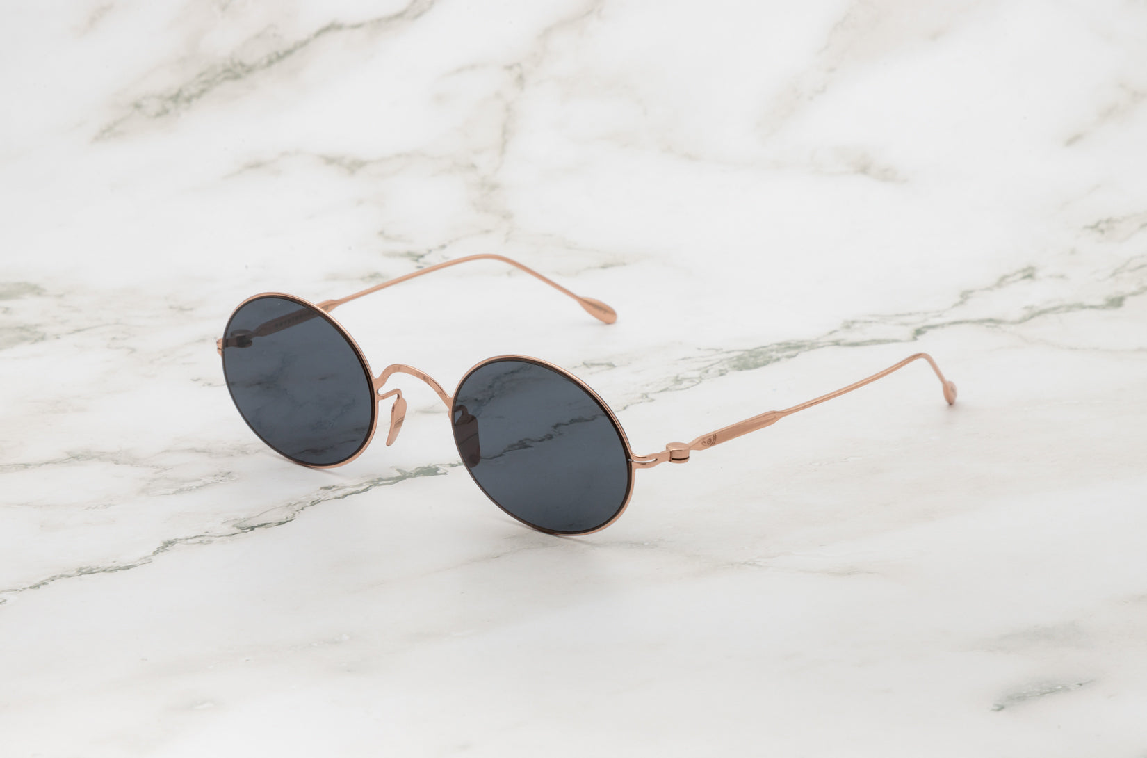 Rose Gold round sunglasses for women with polarized lenses by Kopajos