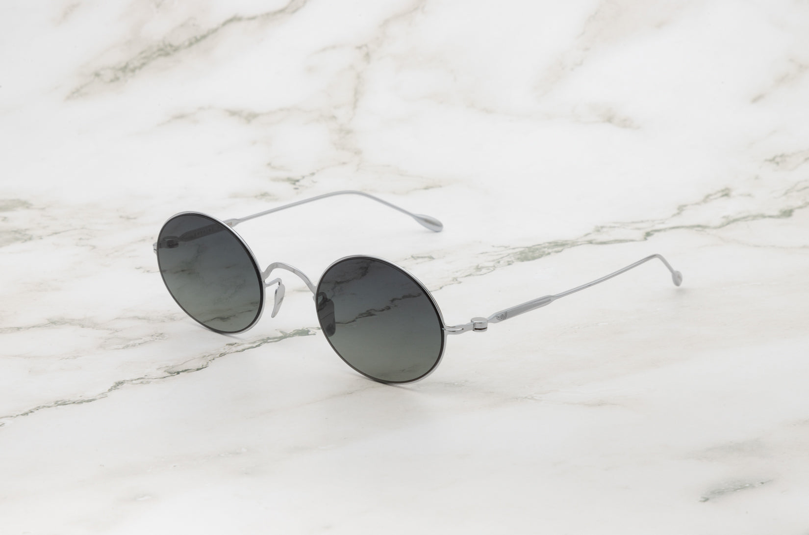 Silver round sunglasses for men and women with polarized lenses by Kopajos