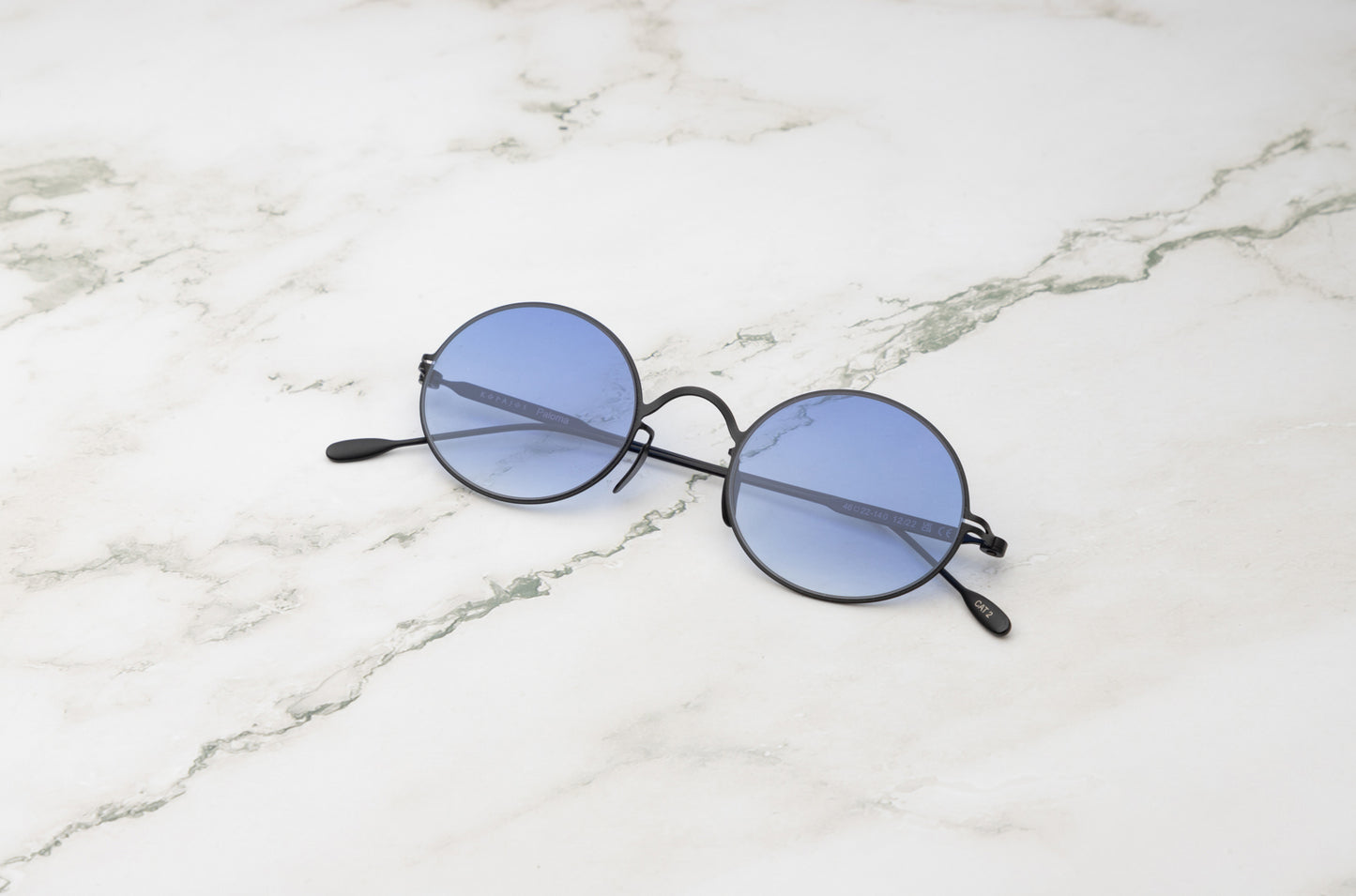 Paloma oval sunglasses for men and women with polarized blue lenses by Kopajos