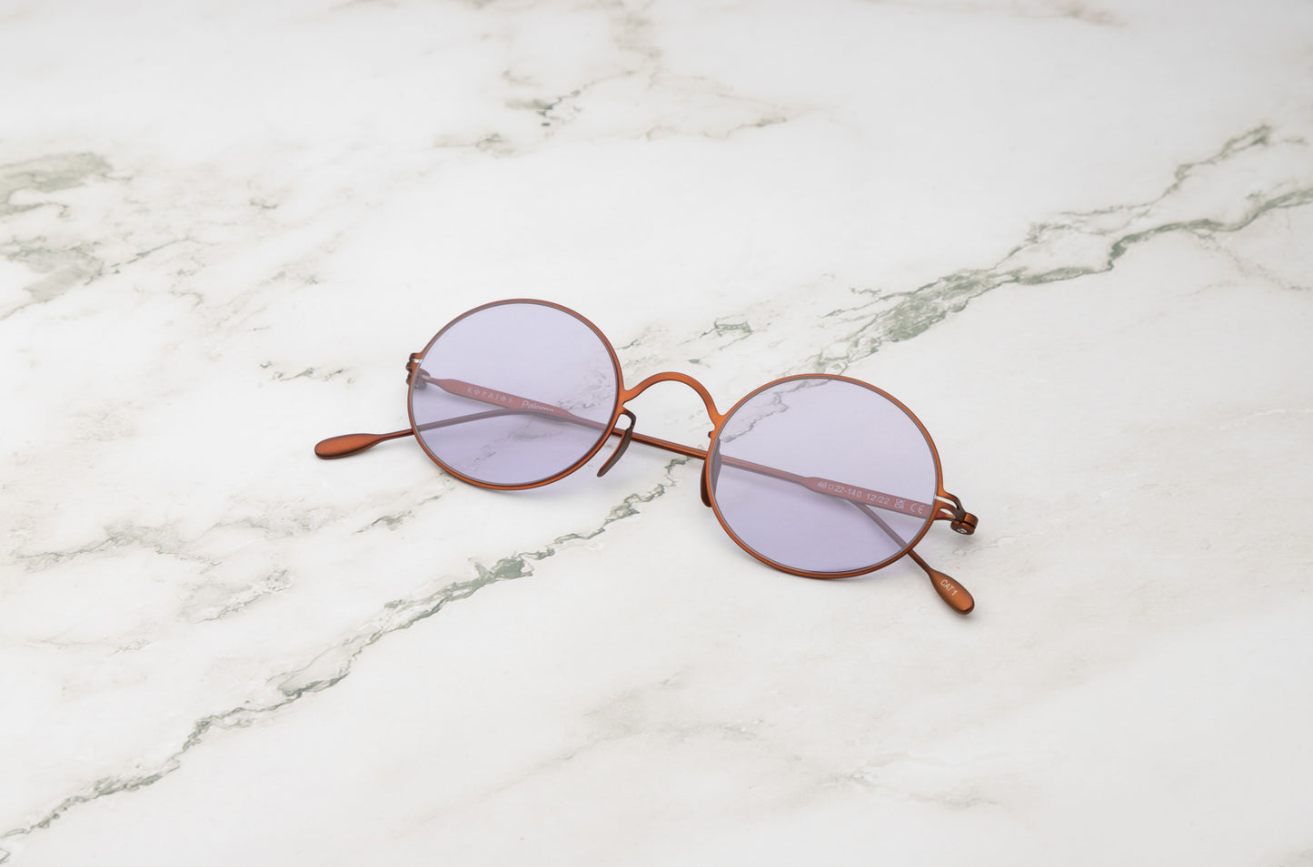 Bronze round sunglasses for women with polarized  violet lenses by Kopajos