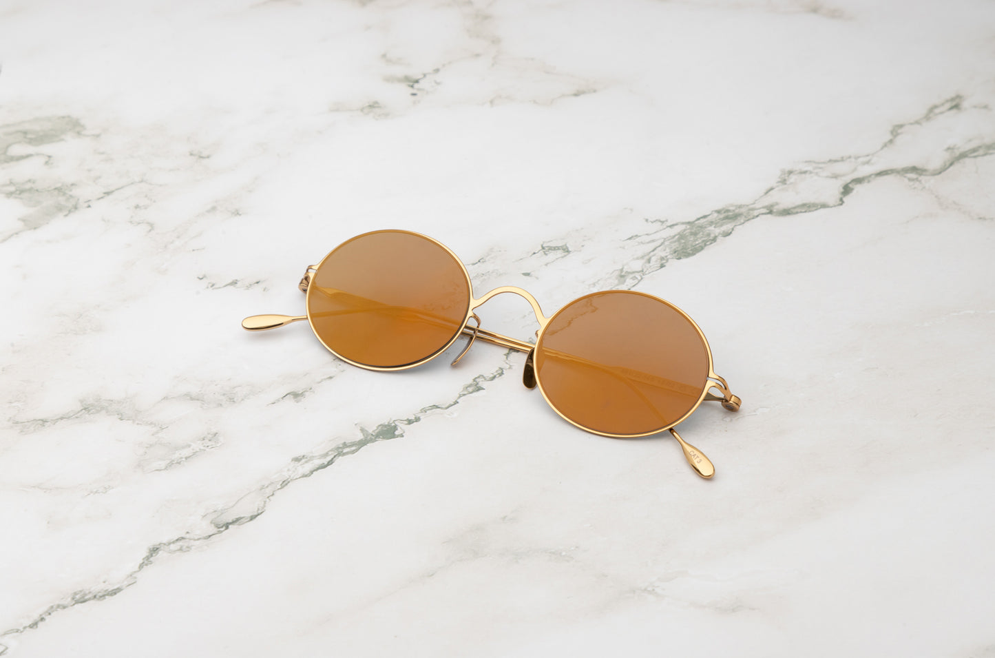 Gold oval sunglasses for men and women with polarized mirror lenses by Kopajos
