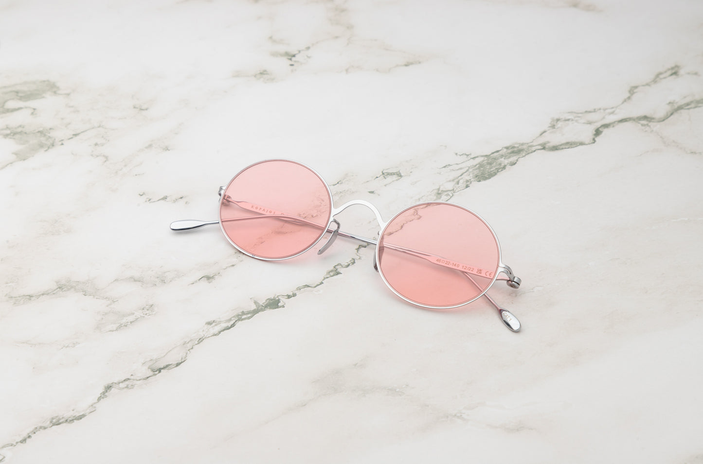 Silver round sunglasses for women with polarized pink lenses by Kopajos