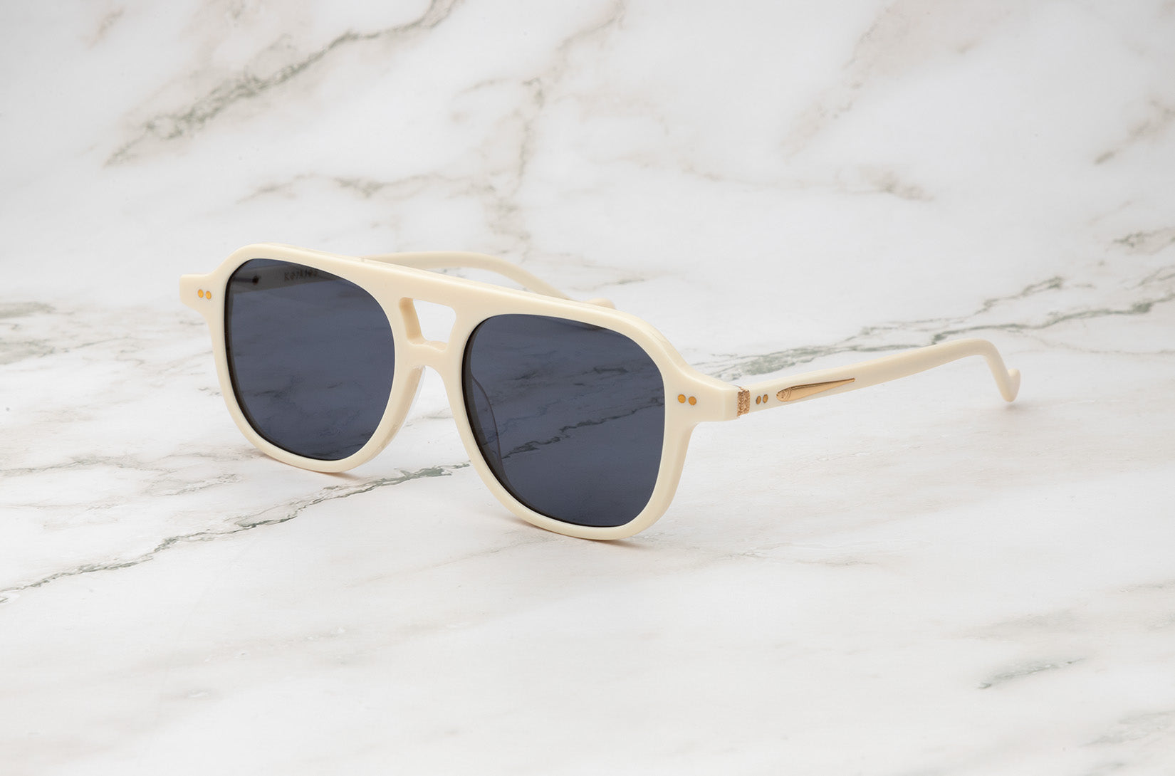 Cream aviator sunglasses for men and women with black polarized lenses by Kopajos