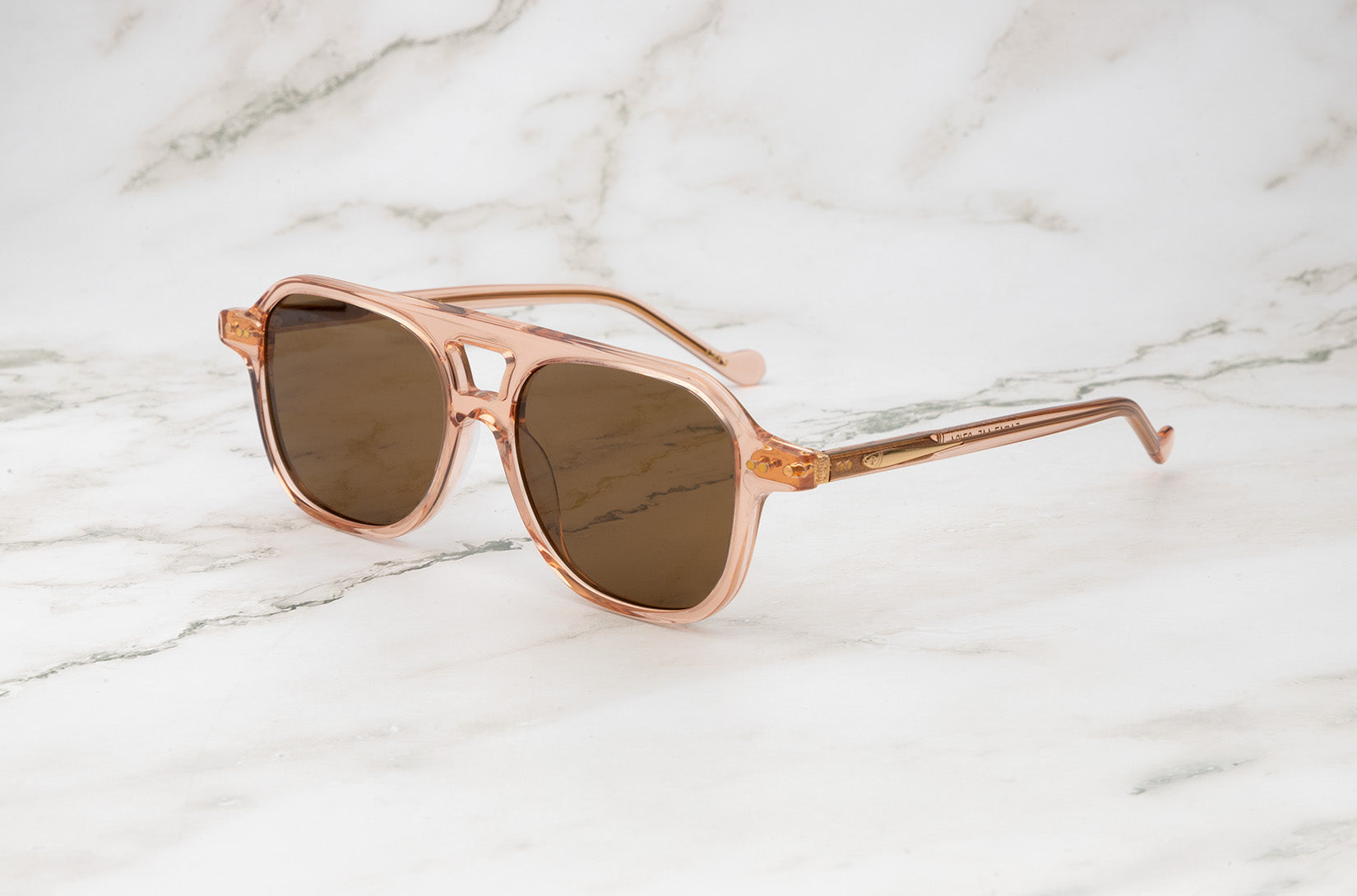 Pink aviator sunglasses for men and women with brown polarized lenses by Kopajos