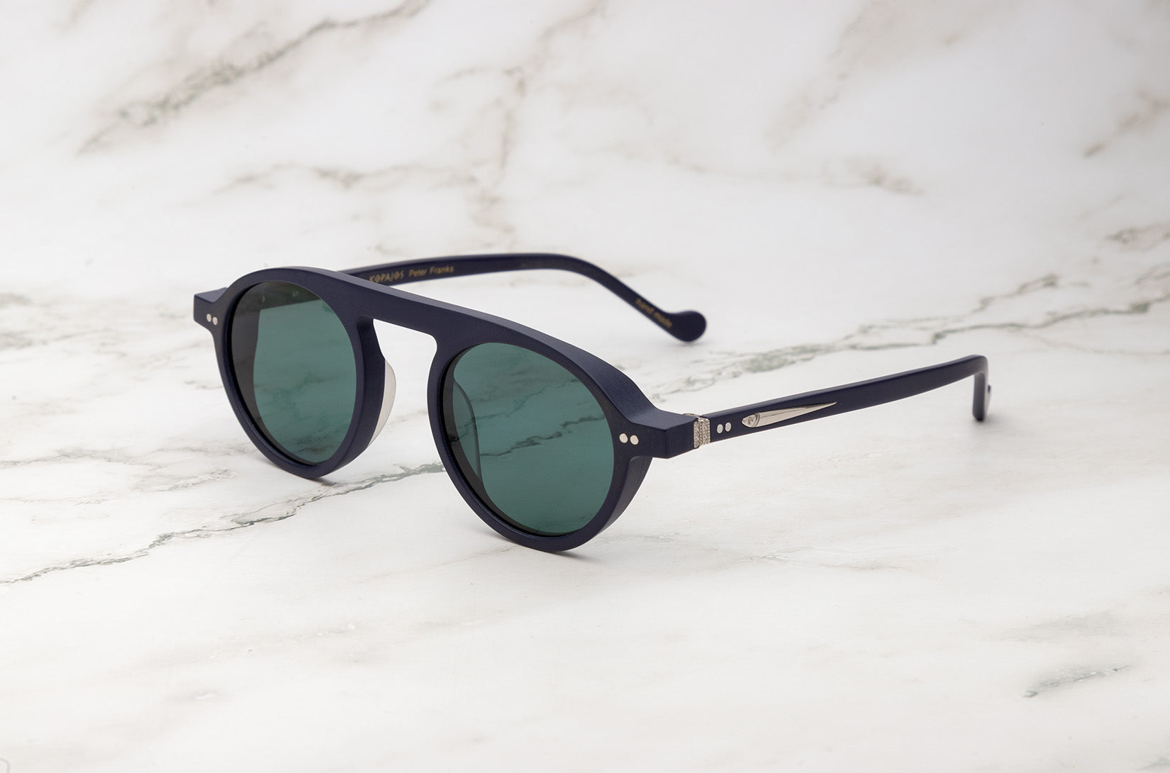 A pair of beautifully rounded sunglasses from the Peter Frank line.