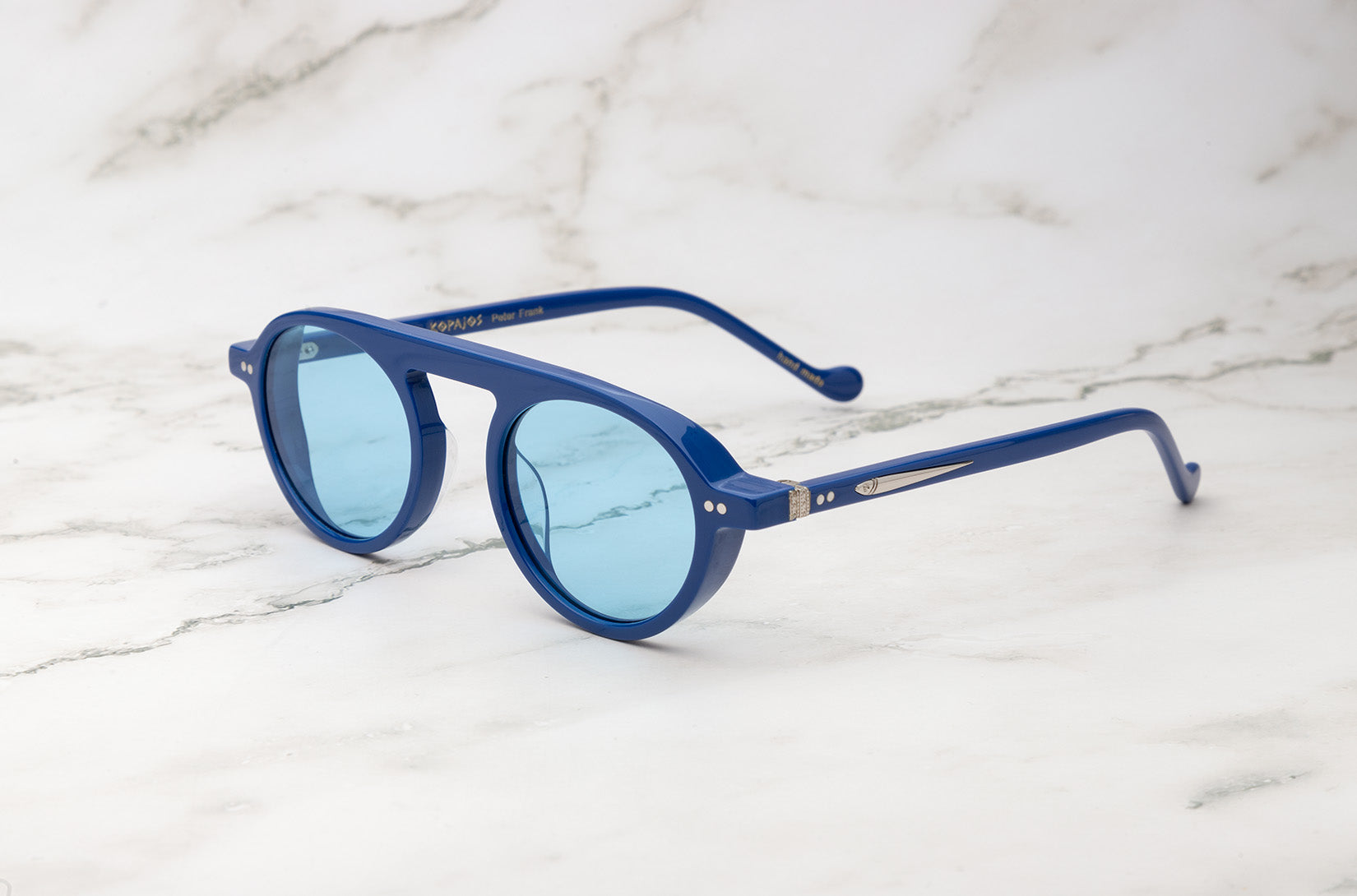 Peter Frank round metal sunglasses with a lightweight frame.