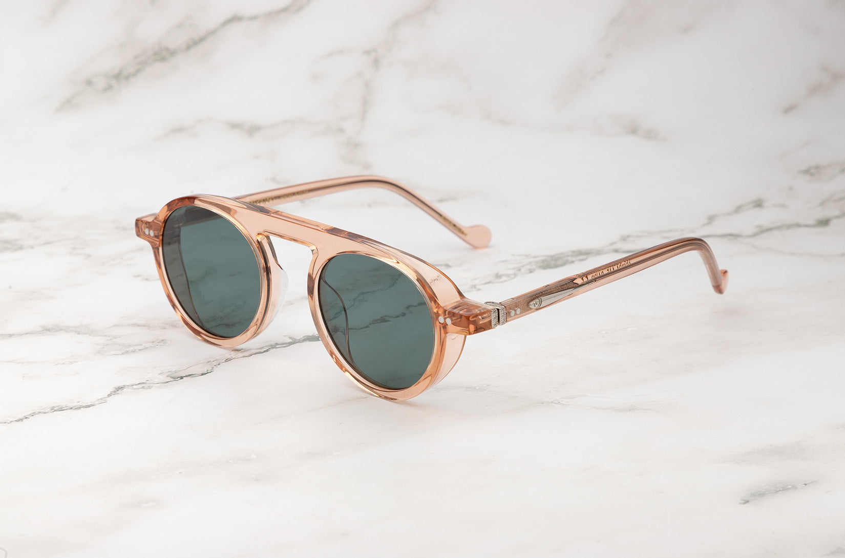 Vintage round sunglasses by Peter Frank.