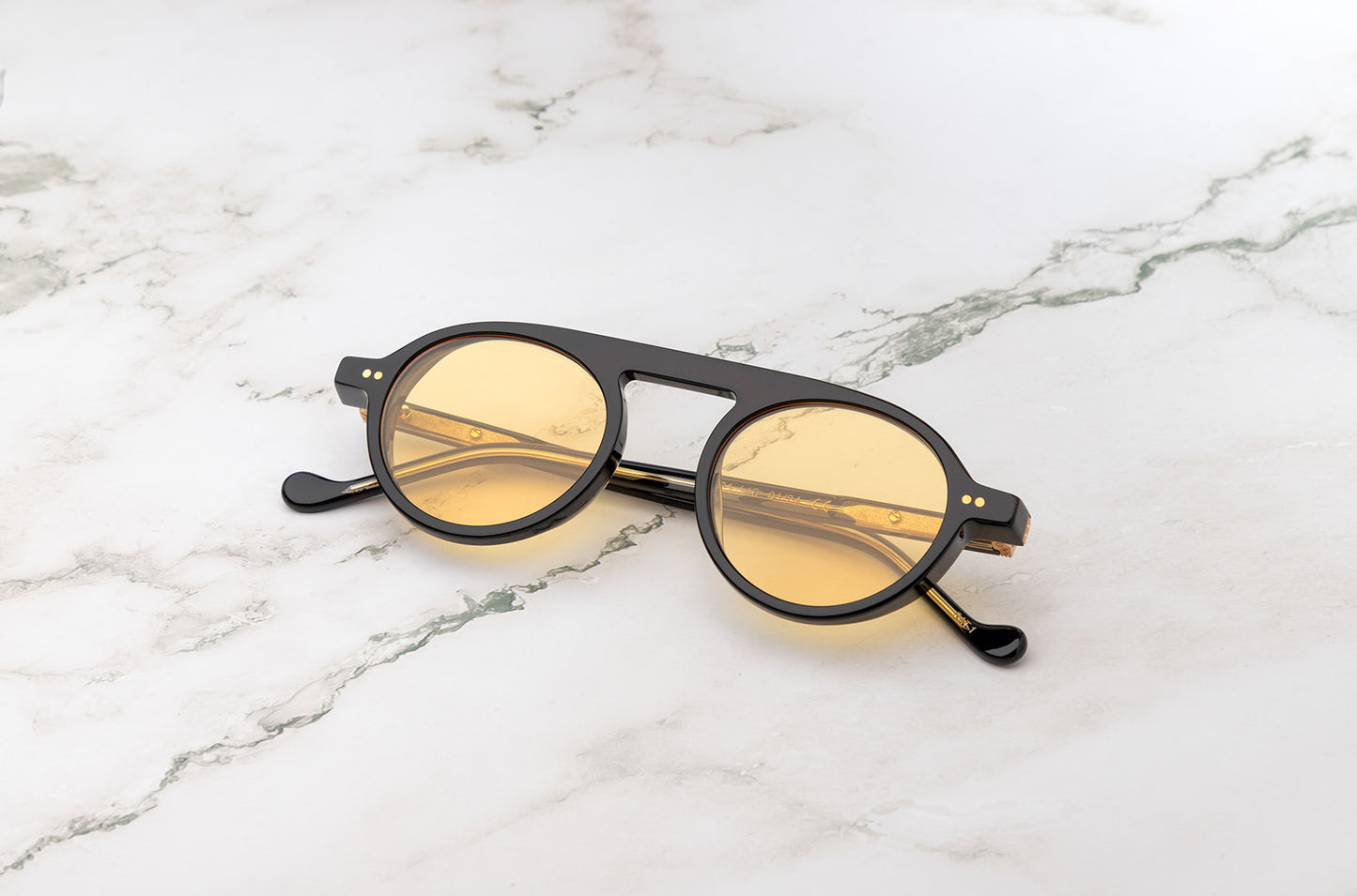 Authentic vintage round circle sunglasses by Peter Frank.