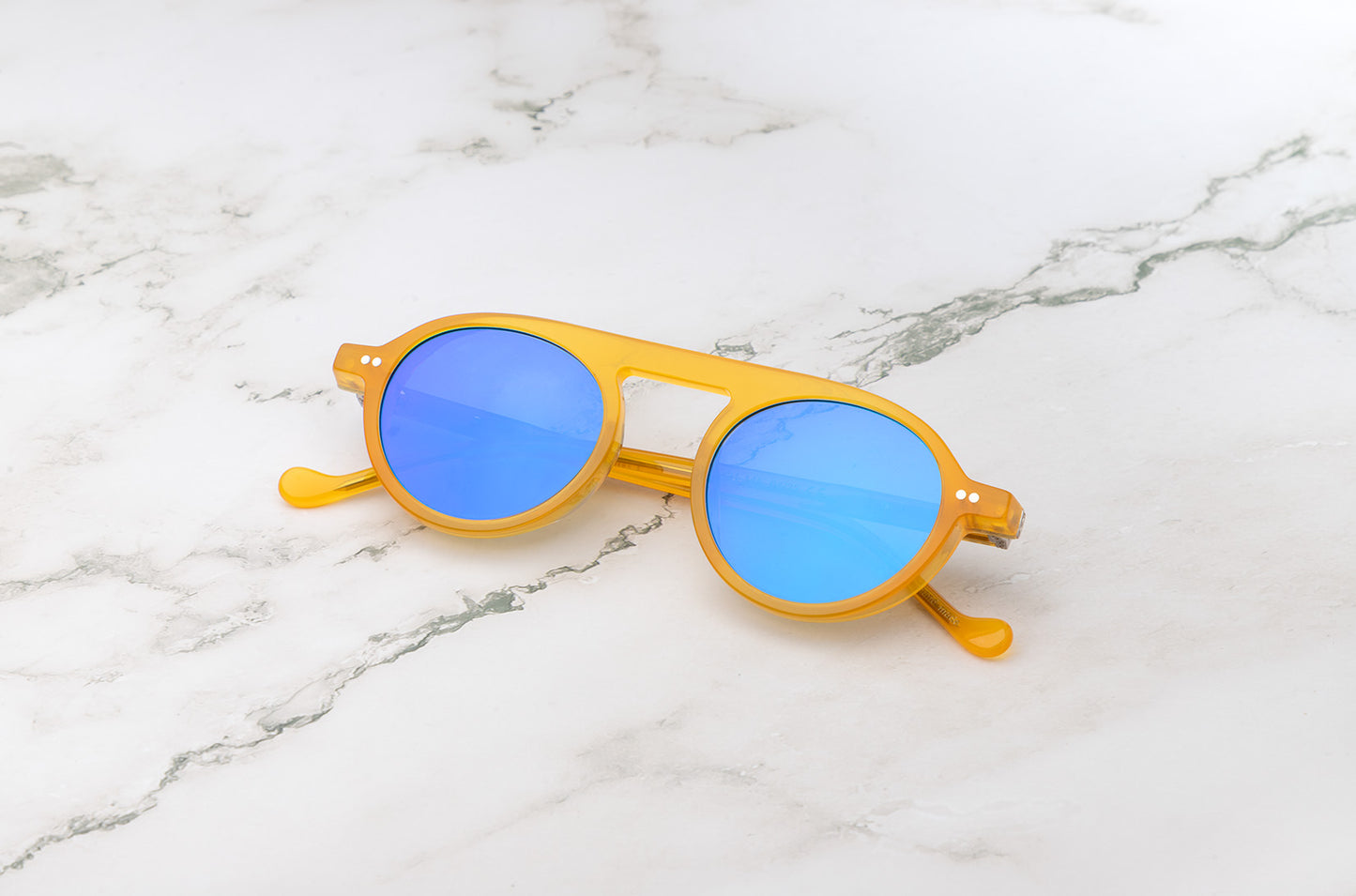 Peter Frank round sunglasses by Kopajos, in-store.