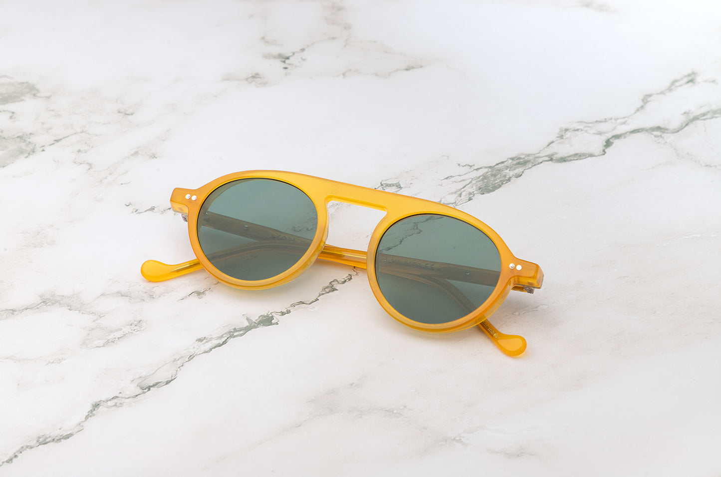 Peter Frank yellow round sunglasses with dark green lenses